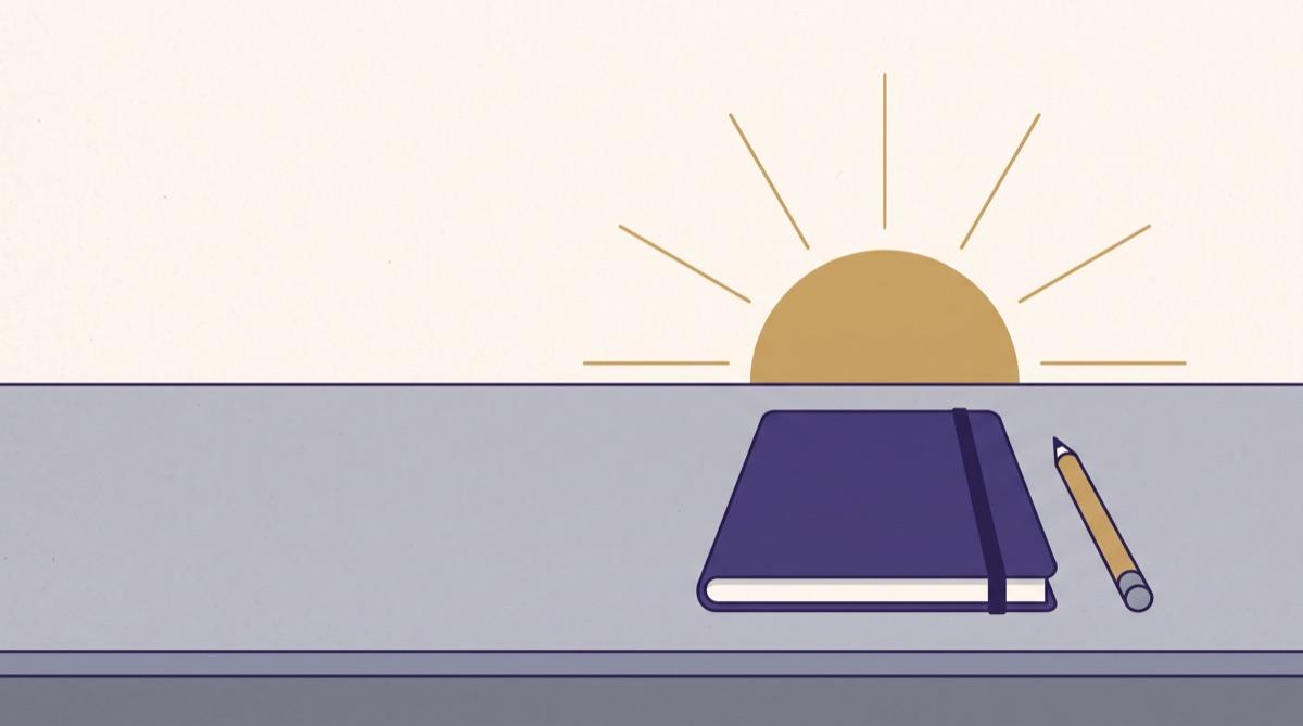 An illustration of a calm morning desk with a closed notebook, a pencil and a low sun rising behind it.